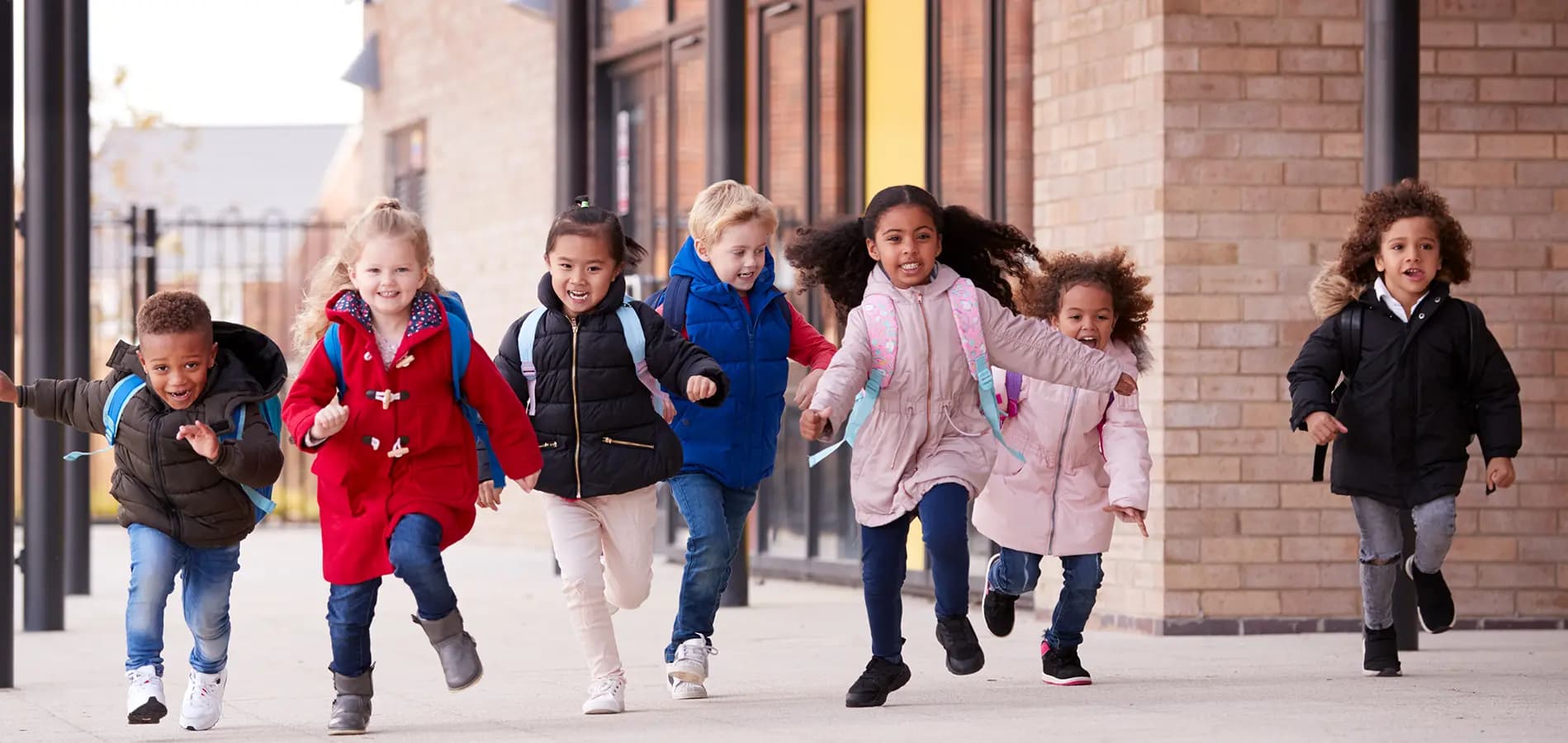 happy-multiethnic-group-young-school-kids-1279137259